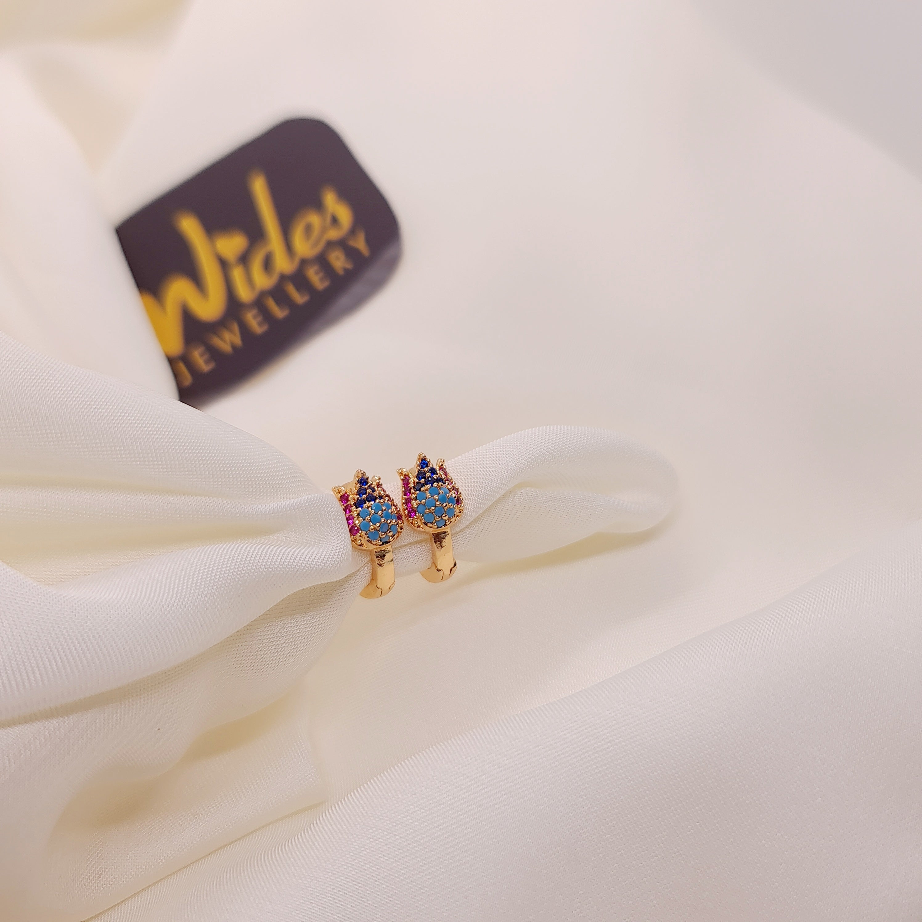 Fancy Design Golden Multicolor Stones Earrings For Girls/women.